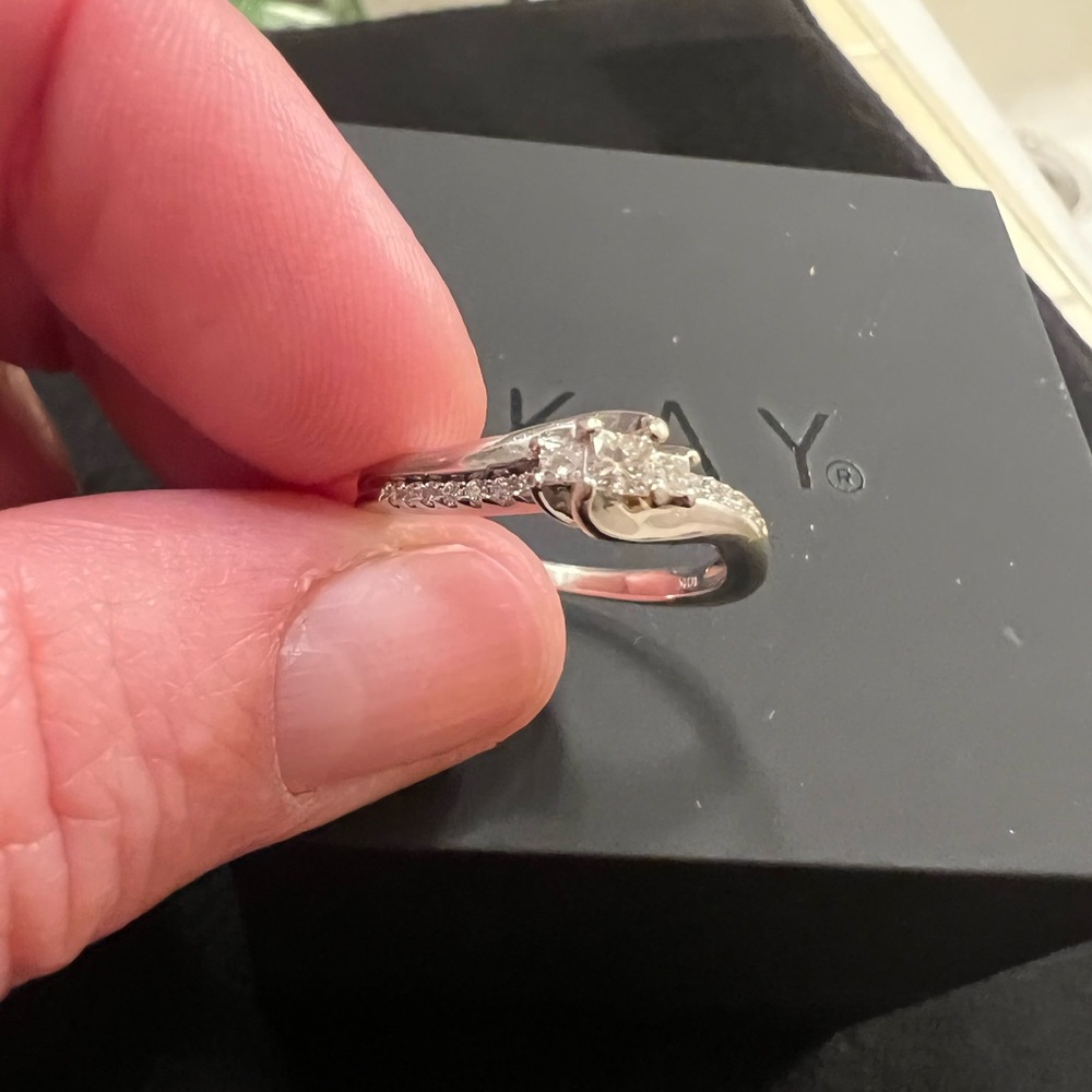 Three stone princess cut Diamond ring.